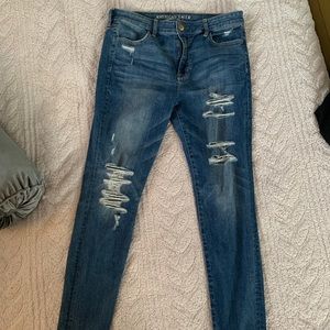 Blue distressed high rise jeans